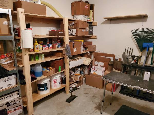 Custom wood storage shelving in a garage